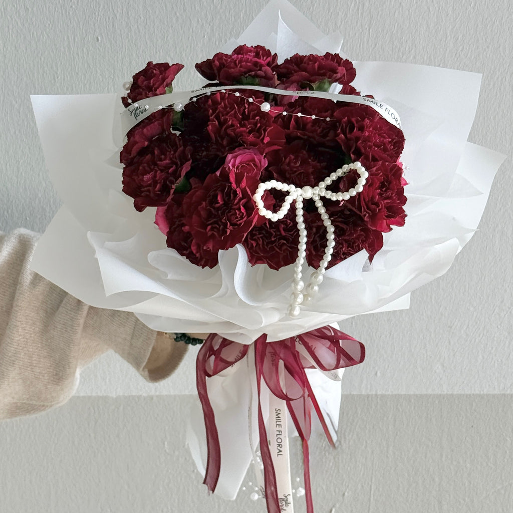 Mama Diane (18 Red Carnations)